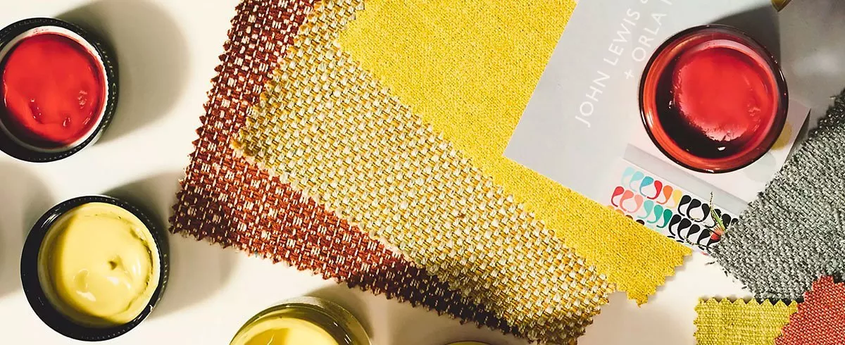 Swatches with a can of red paint on top