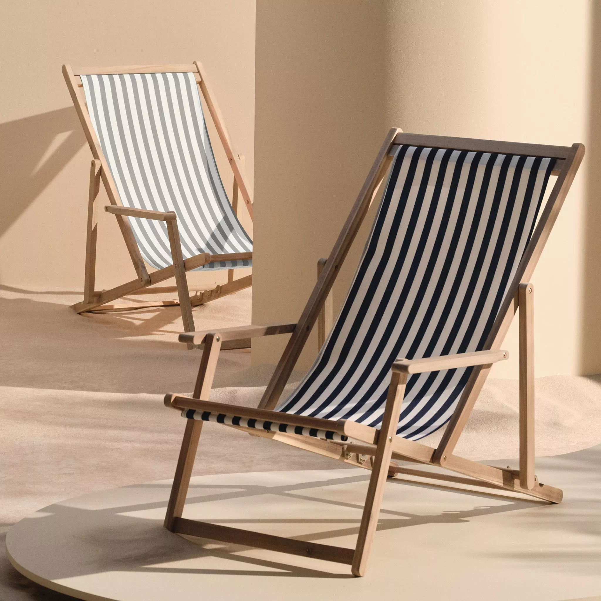 Two deck chairs with striped fabric