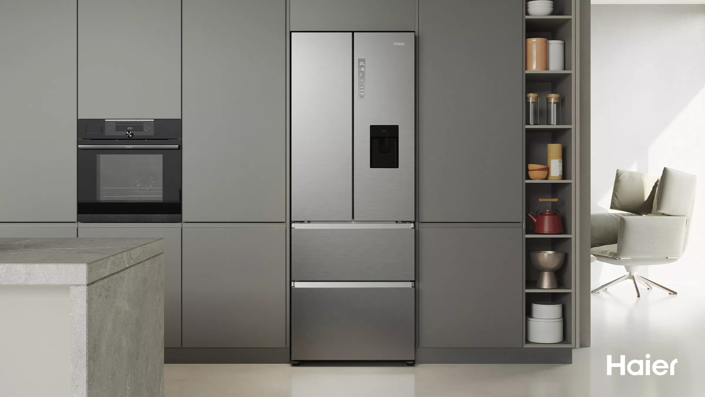 Modern grey kitchen with stainless steel Haier French door fridge freezer and built-in oven cabinetry