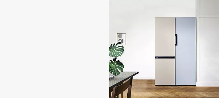 Open tall white Miele larder fridge with glass shelves, door racks, and fresh fruit and veg inside
