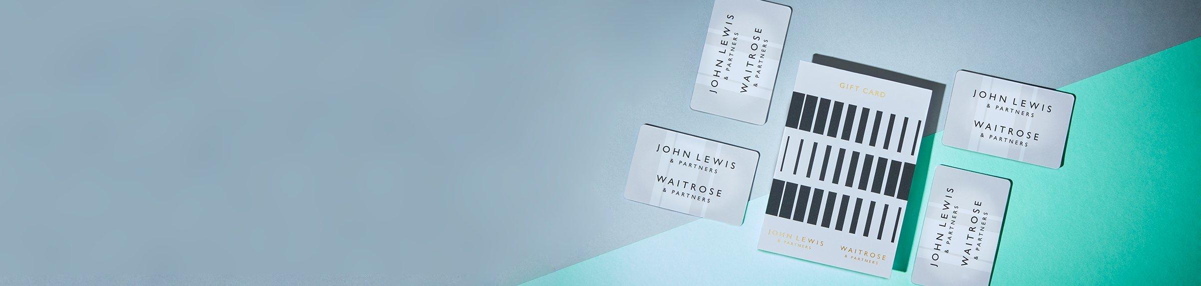 Image of gift cards on a blue/green background