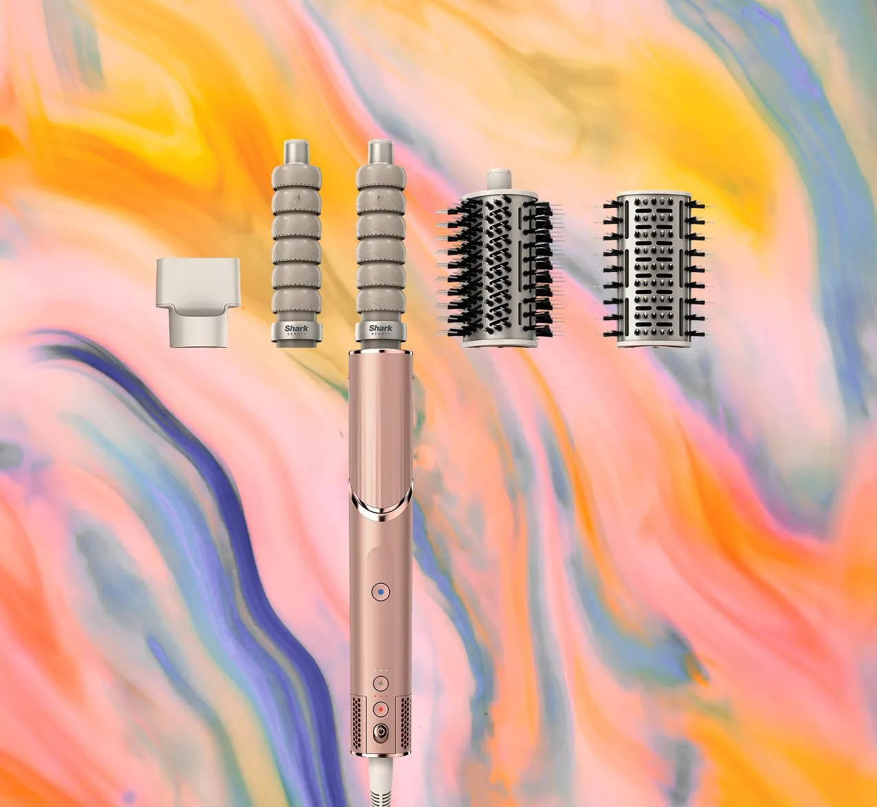 Hair styling tool with attachments on a vibrant, multicoloured background. Includes brushes and curling barrels.