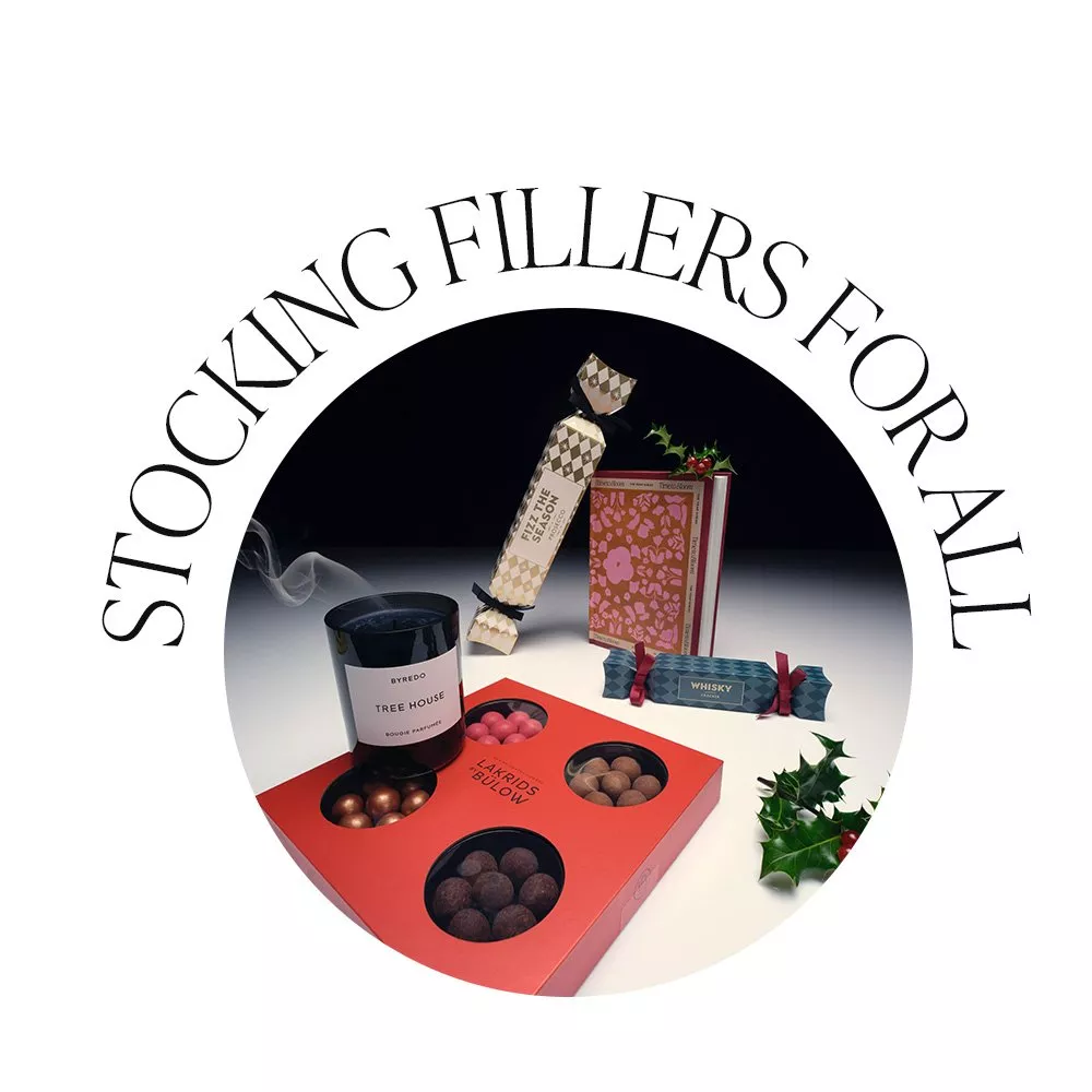 Selection of food gifts and a candle