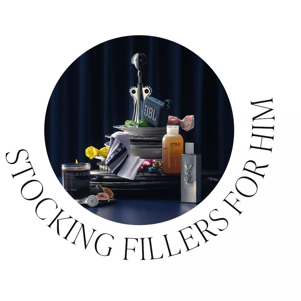 Various small gifts stacked on a pile of plates