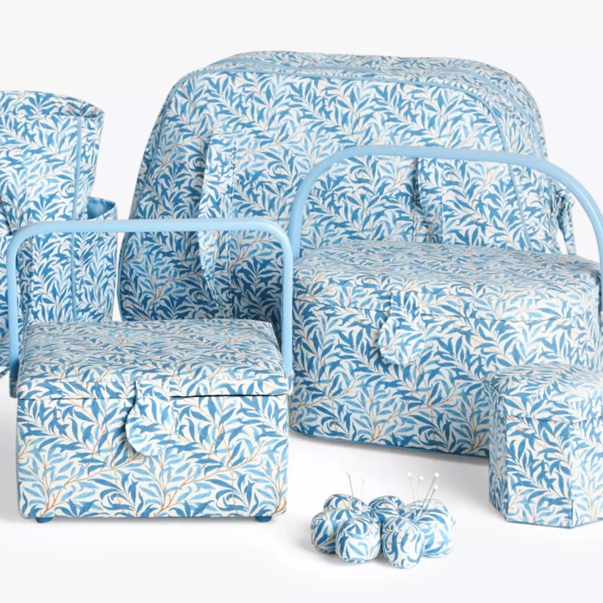 A collection of craft storage options all with a blue leaf pattern
