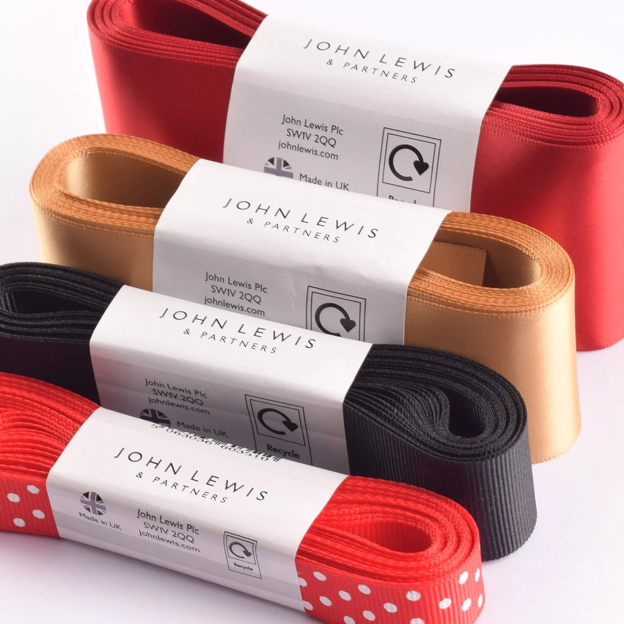 A selection of red, black and gold ribbon