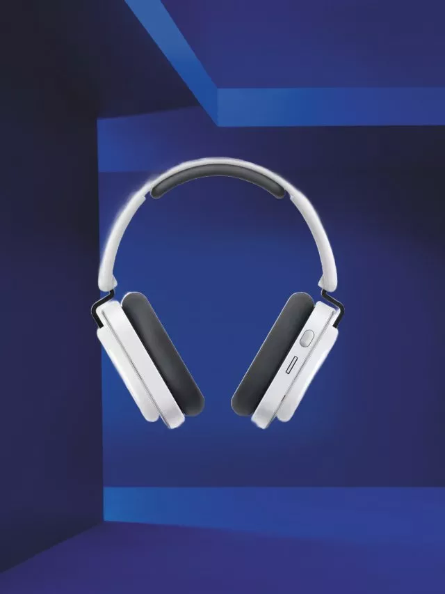 White wireless over-ear headphones with black ear cushions on a blue background, modern audio gadget product shot