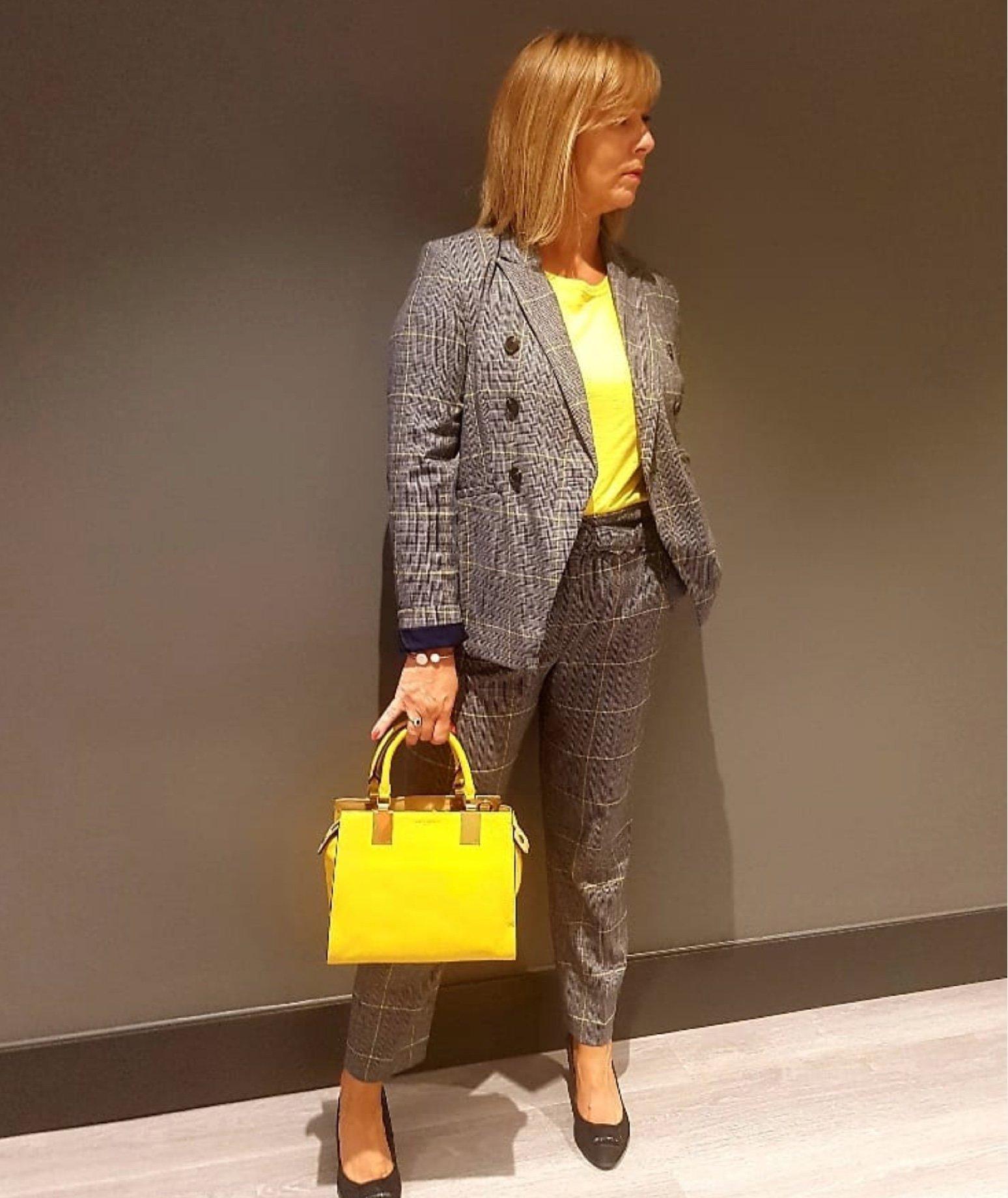 Caroline in her office outfit
