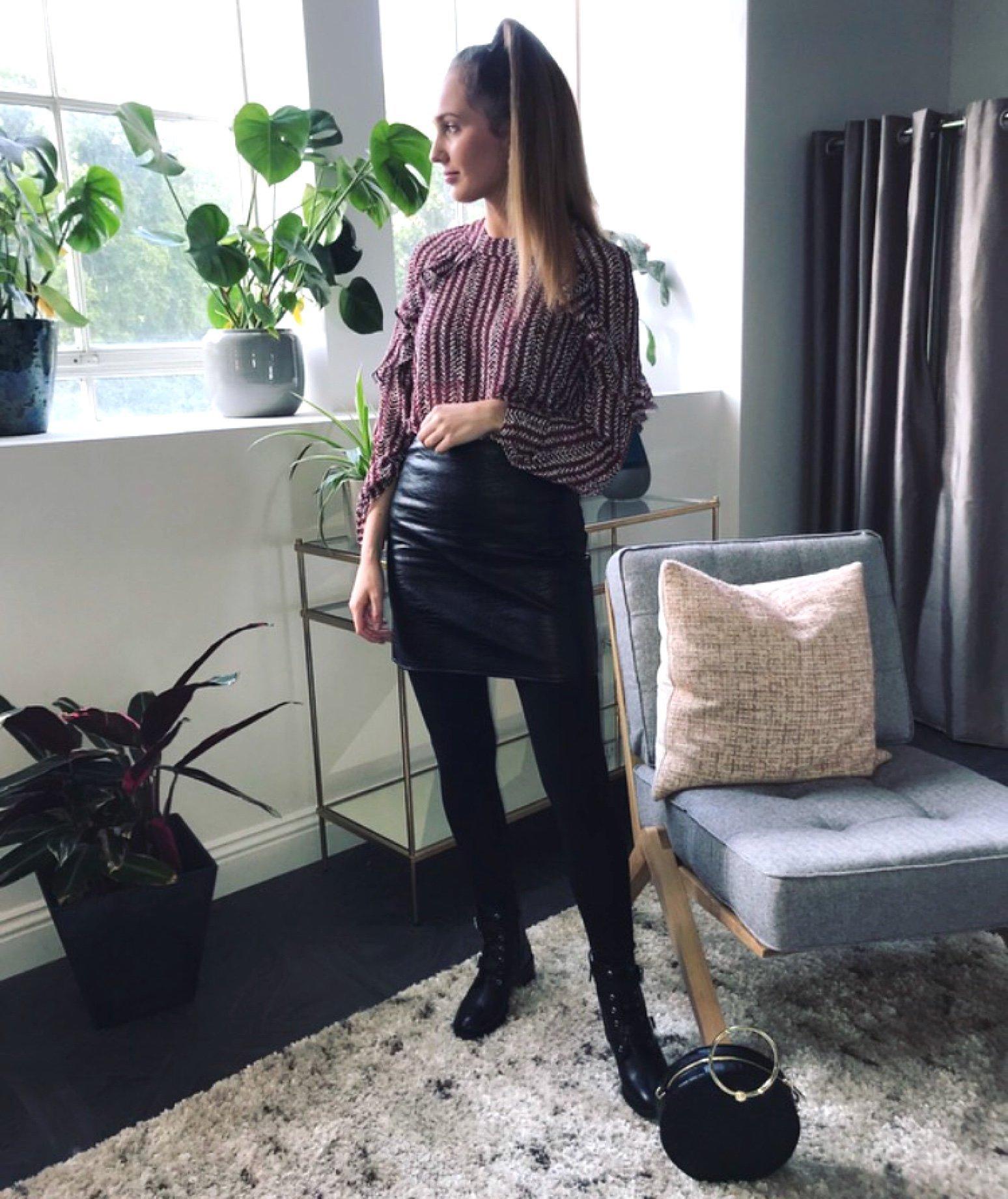 Catherine with her leather skirt look