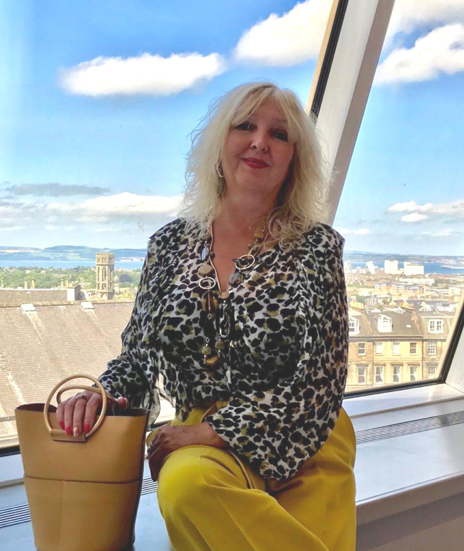 Mary in her wide leg trousers