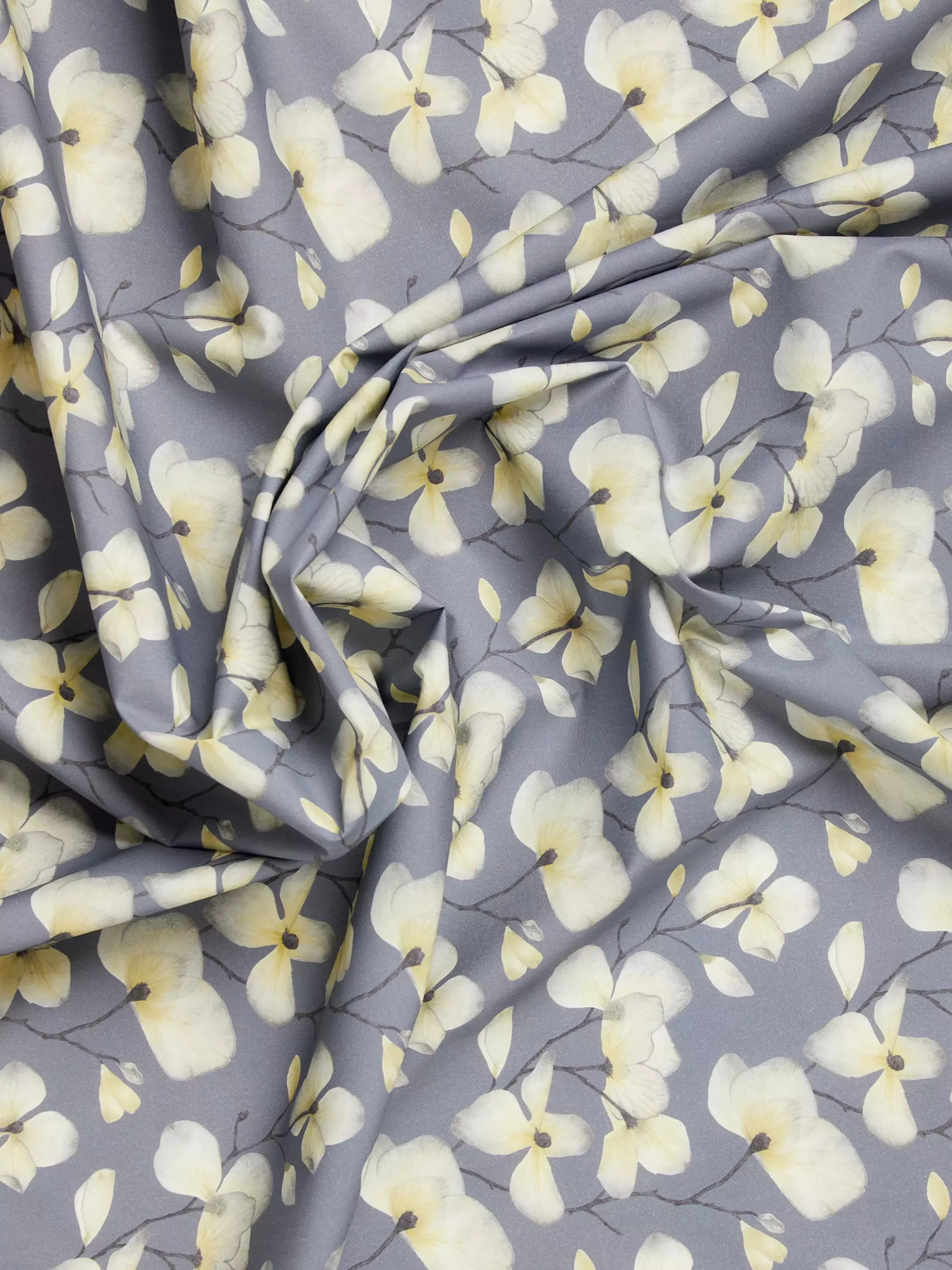 Blue fabric with white and yellow floral pattern