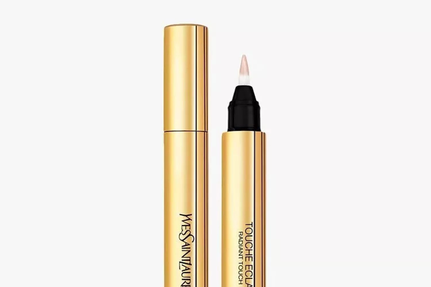Yves Saint Laurent Touche Éclat radiant touch concealer pen in gold packaging, brush tip applicator close-up