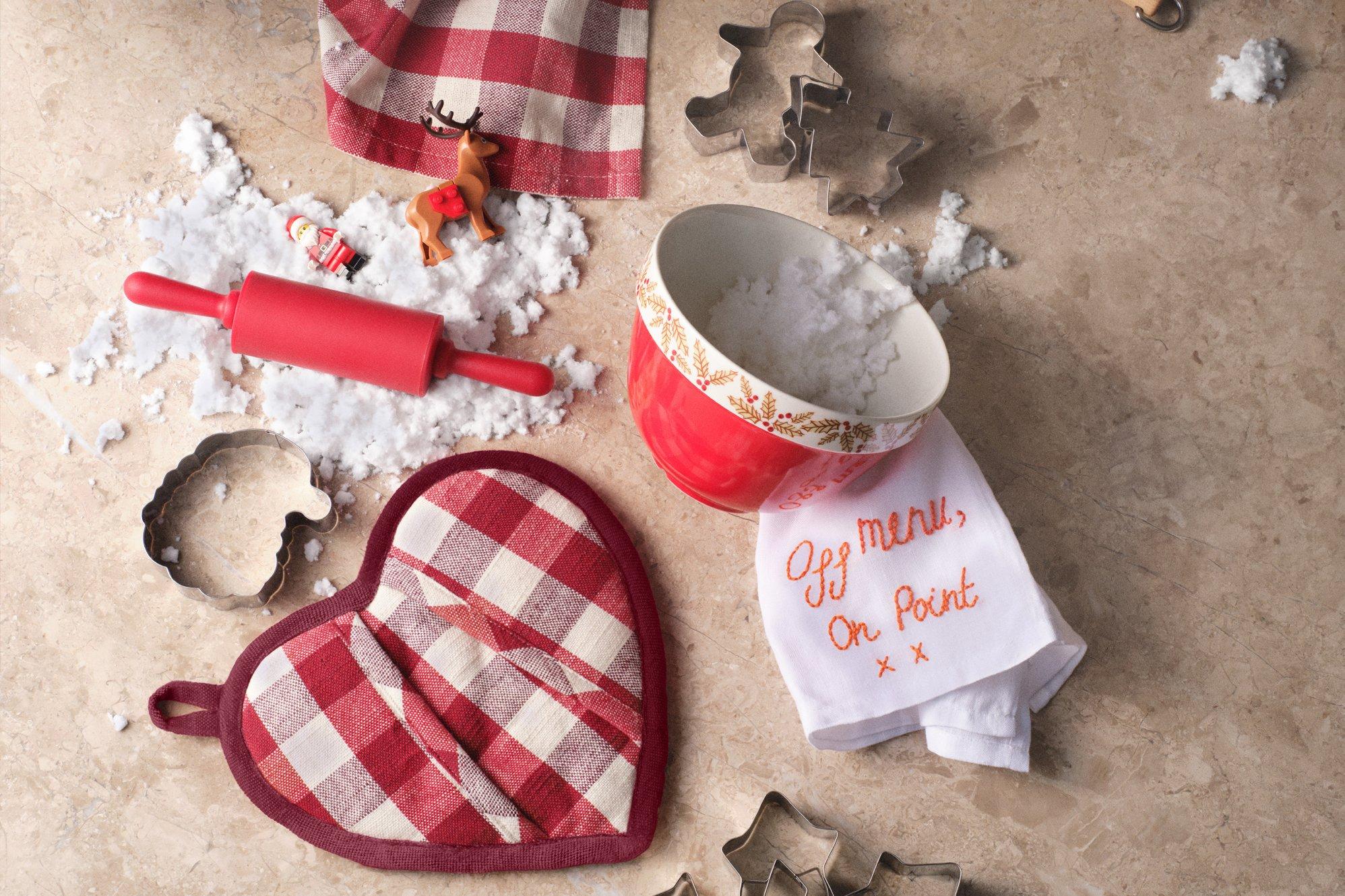 Image of a messy kitchen with all Christmas baking equipment