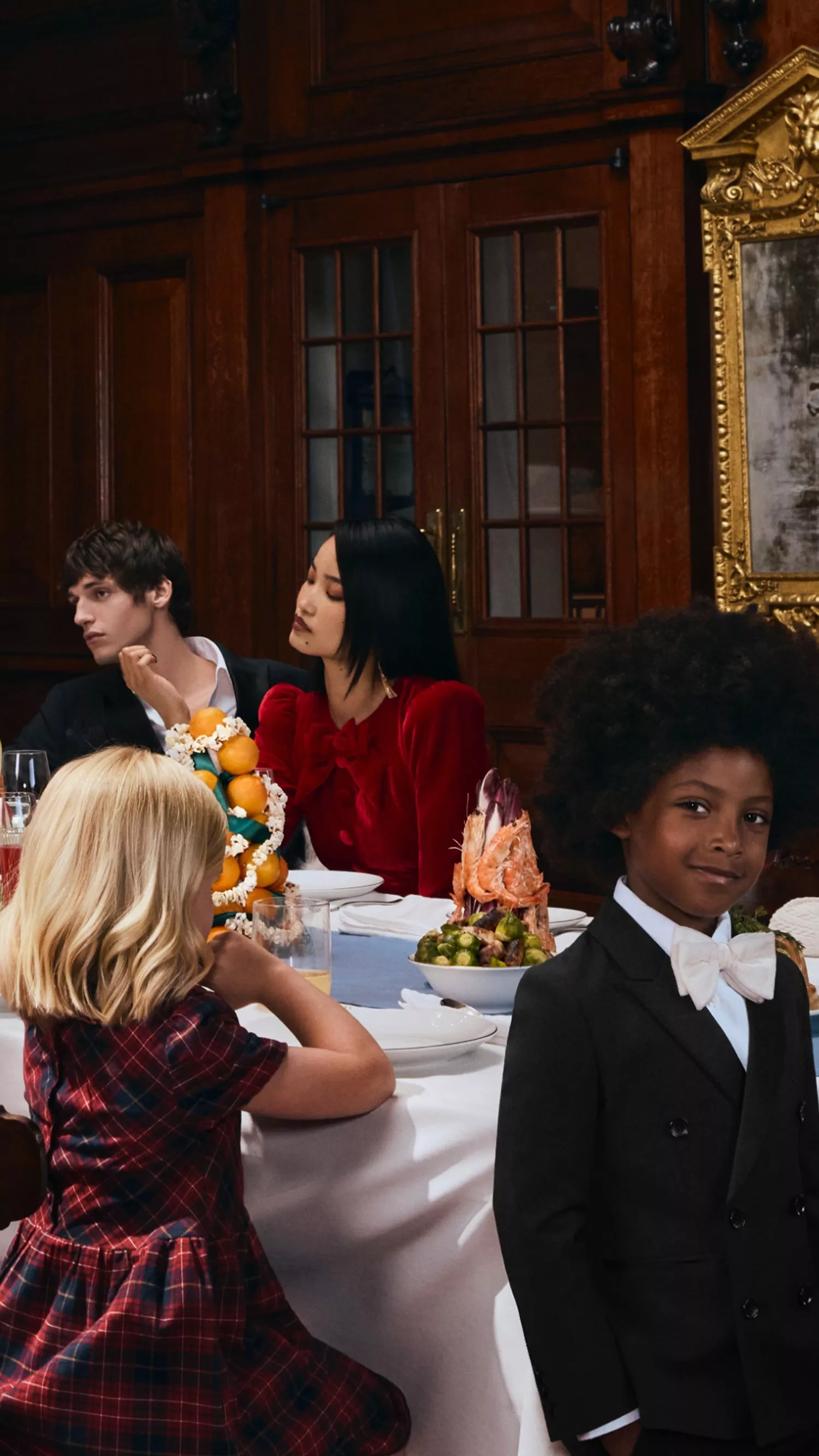 Guests sat around a Christmas dining table