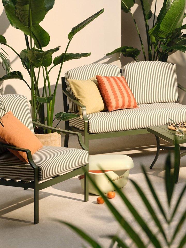 Green Garden Furniture with striped cushions