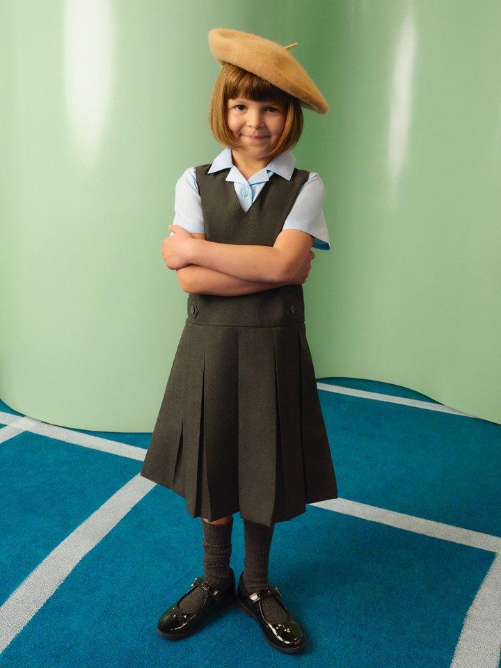 A girl wearing school uniform
