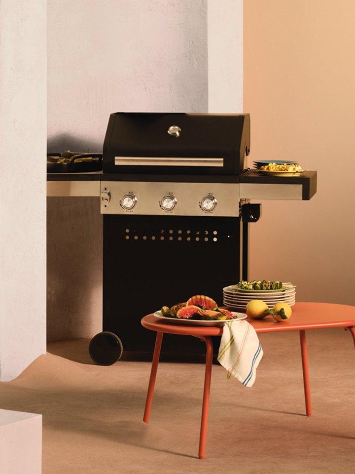 A BBQ arranged in an outdoor setting