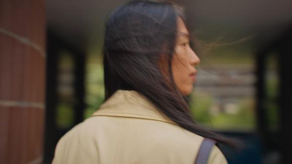 Lady wearing coat from our new John Lewis collaboration with Rejina PYO
