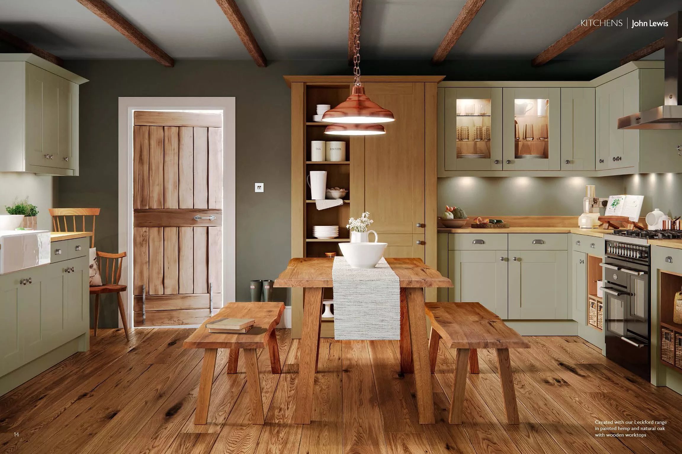Kitchen setting with wooden and sage green features 