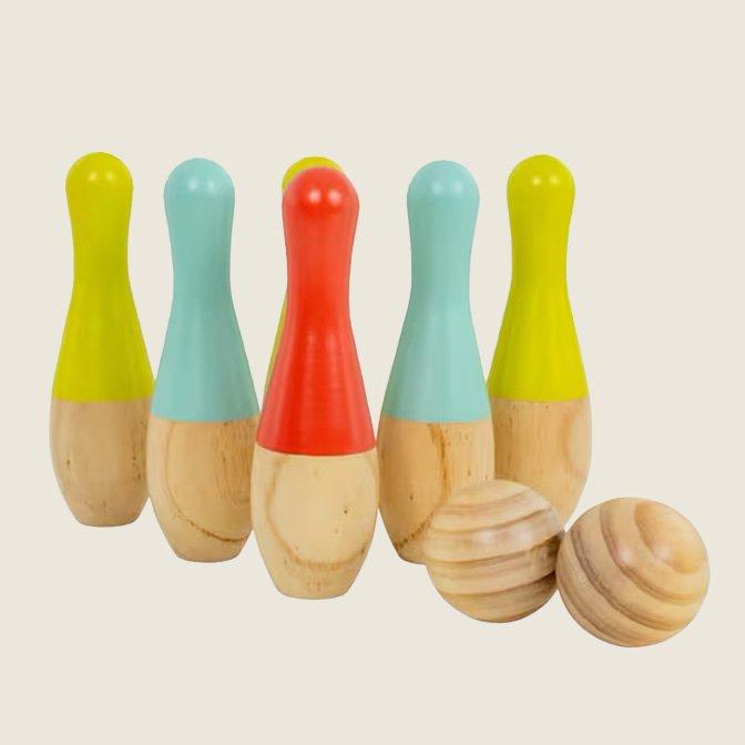 Colorful wooden bowling set with six pins and two balls designed for children