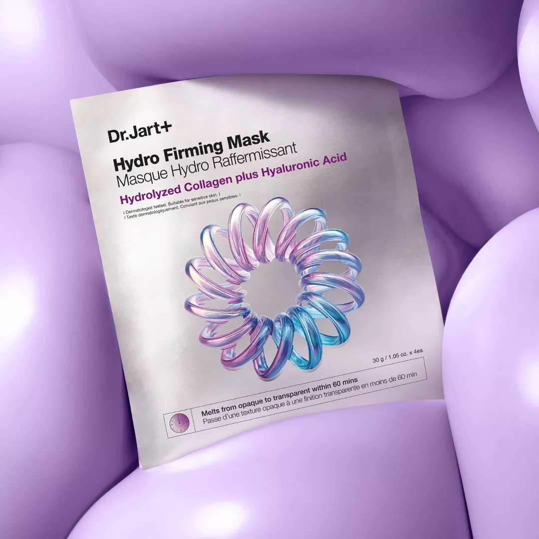 Dr.Jart+ Cryo Rubber sheet mask packs in blue, pink, yellow and green on pastel bubbles, skincare flat lay