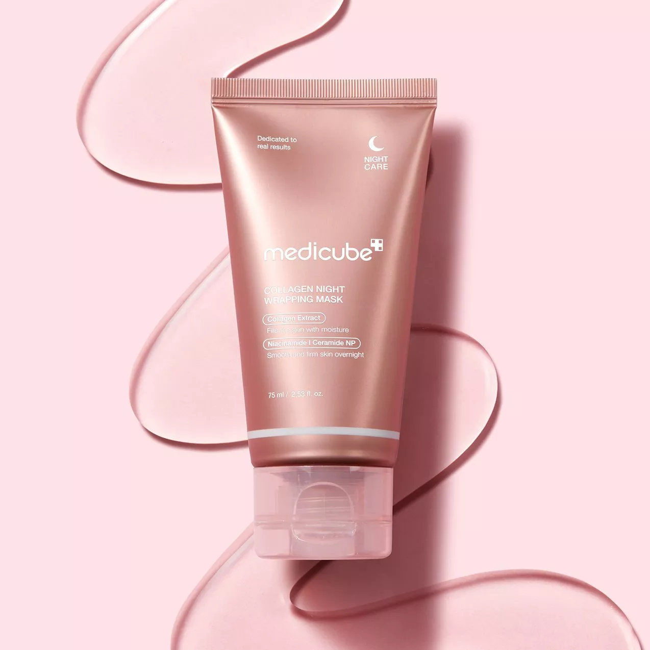 Medicube Collagen Night Wrapping Mask tube on pink background, overnight moisturising skincare with niacinamide and ceramides