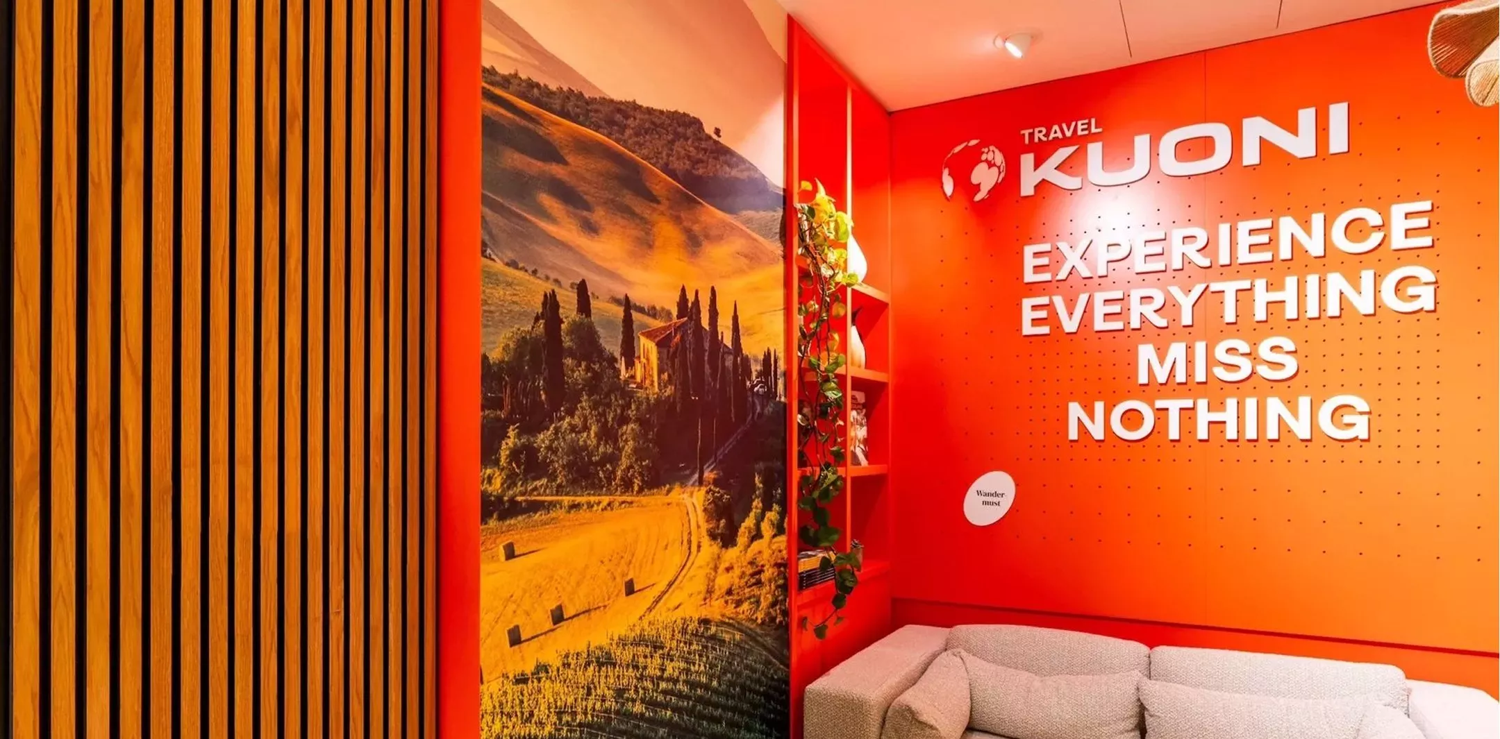 Kuoni logo on an office wall 