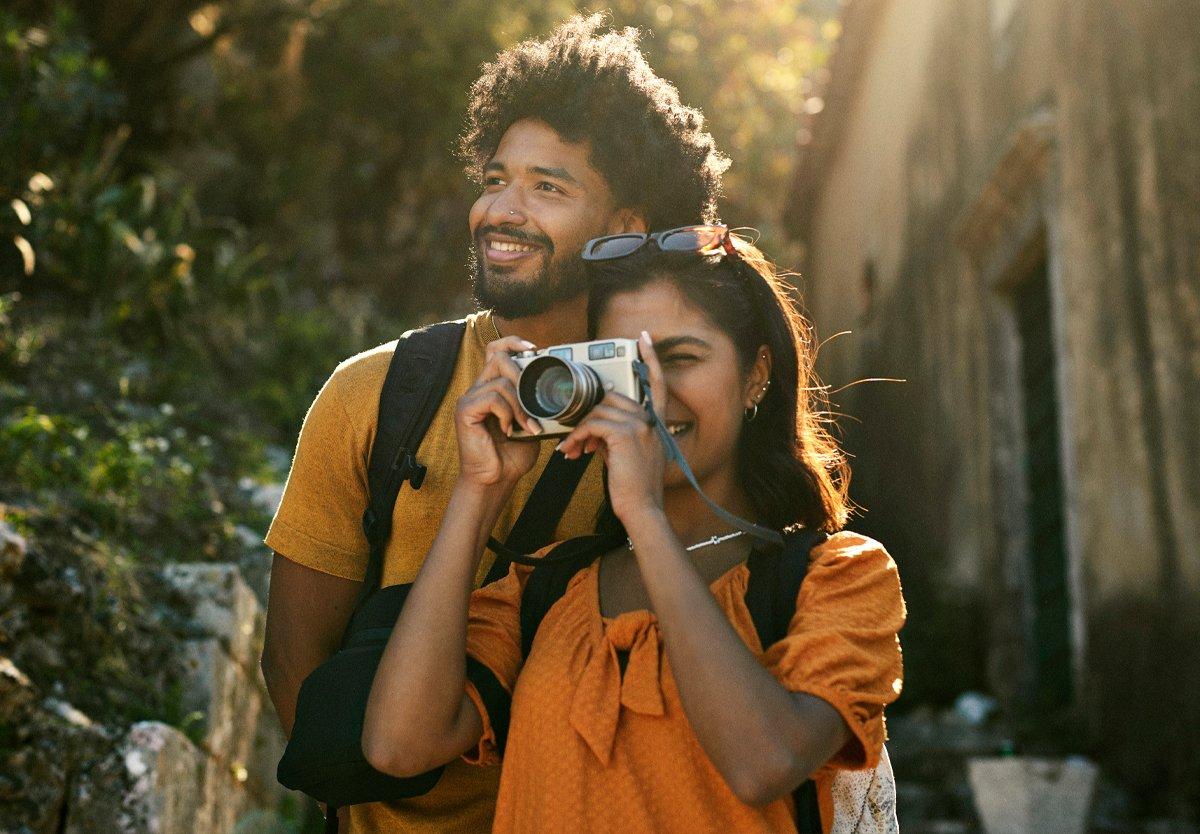 a couple on honeymoon taking a picture