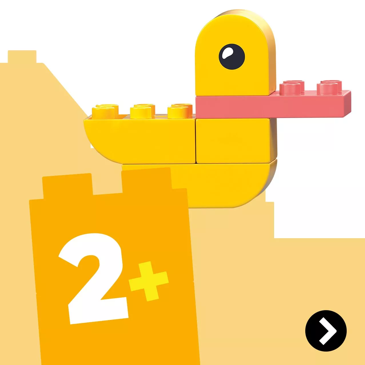 Yellow LEGO-style duck made from building blocks, with 2+ age label, on a clean white background