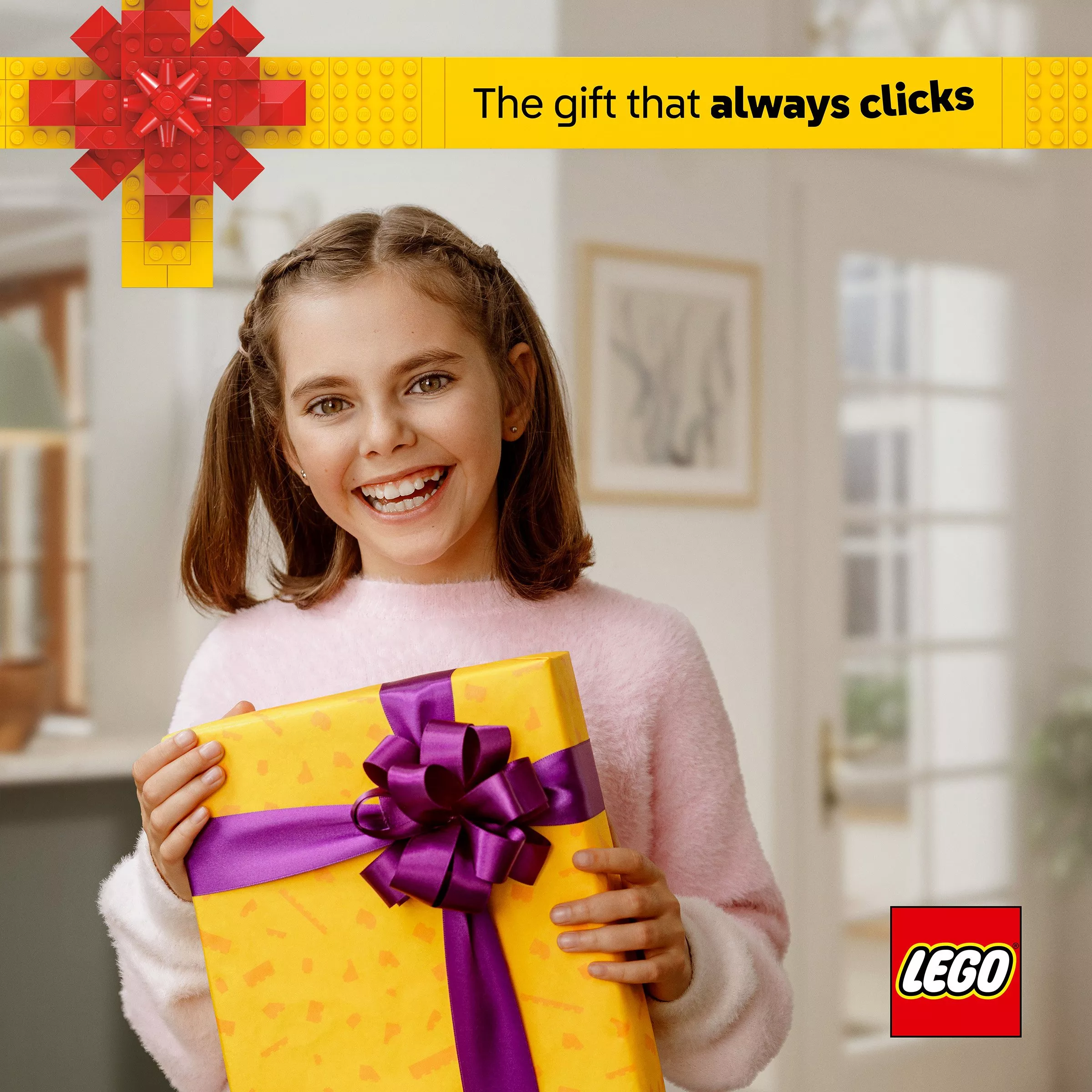 image of a girl holding a present box