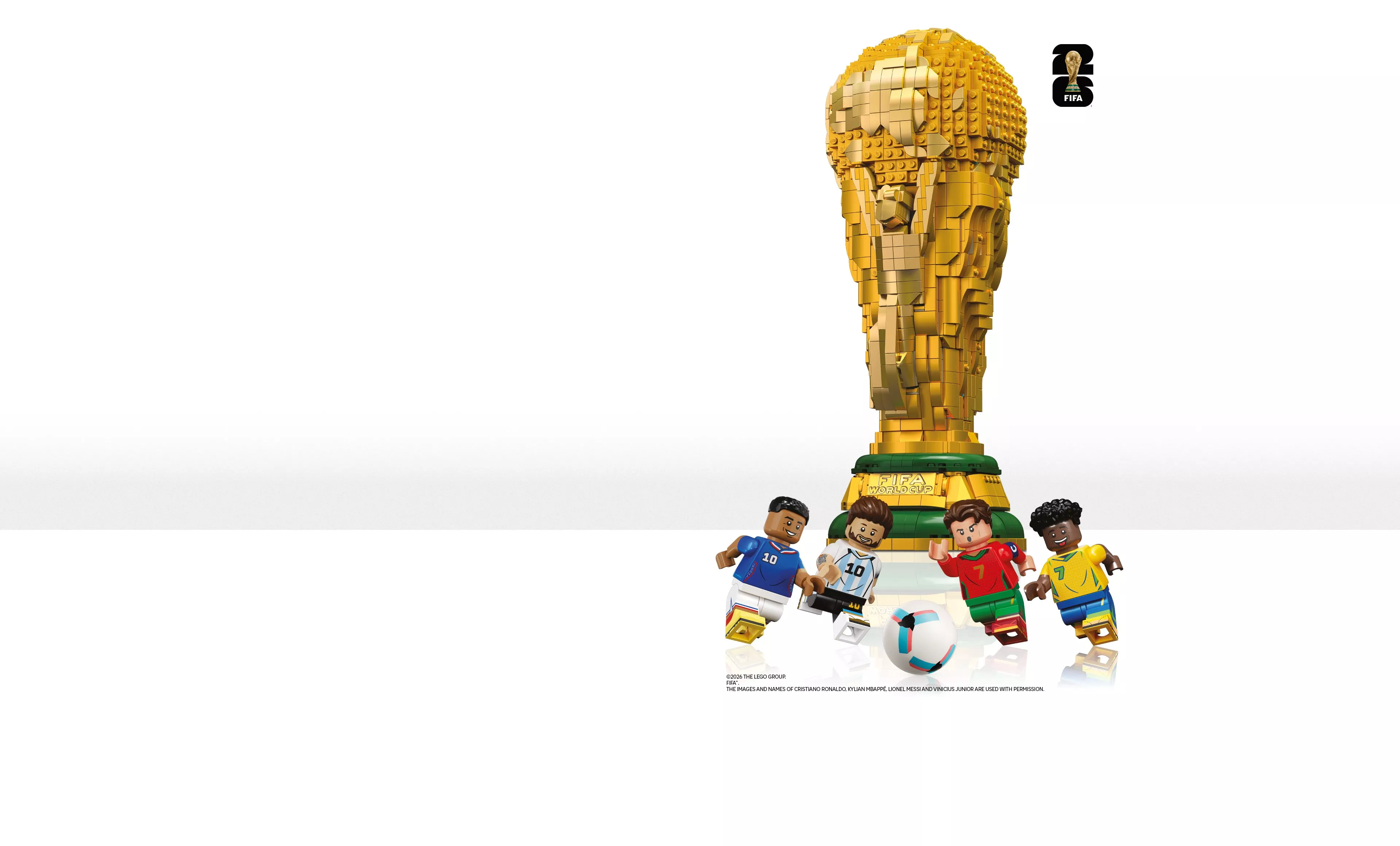 LEGO FIFA World Cup Trophy build with minifigure footballers and ball on a clean white background