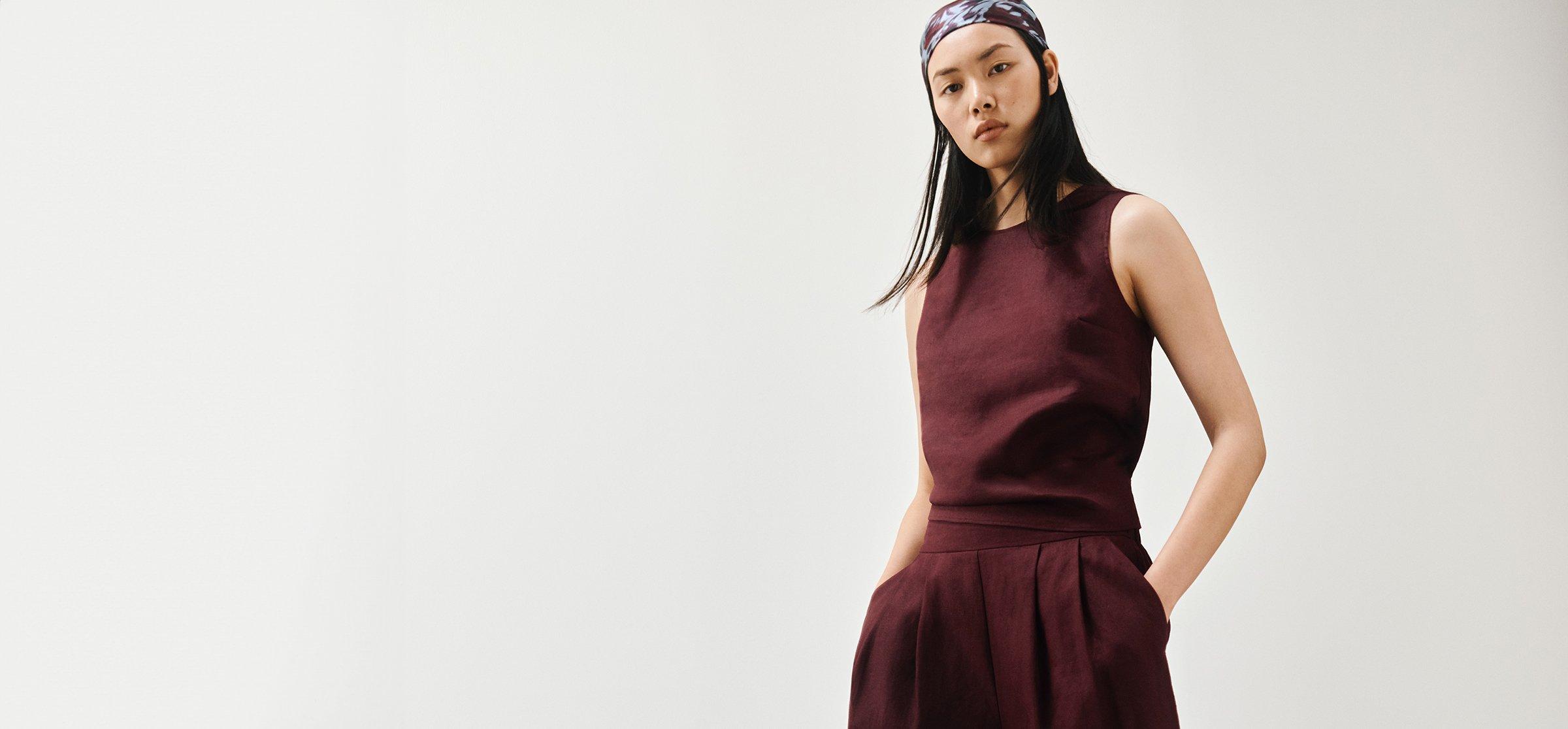 Image of a stack of presents on a pink background