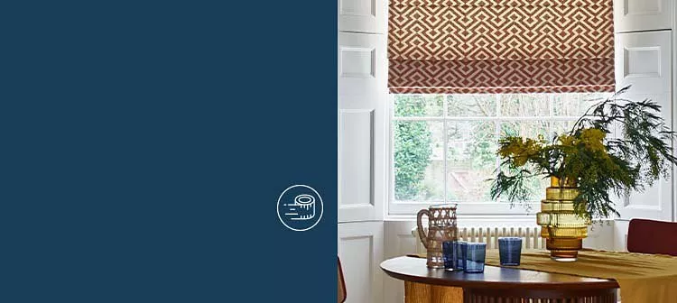 Grey roman blinds in a bathroom setting 