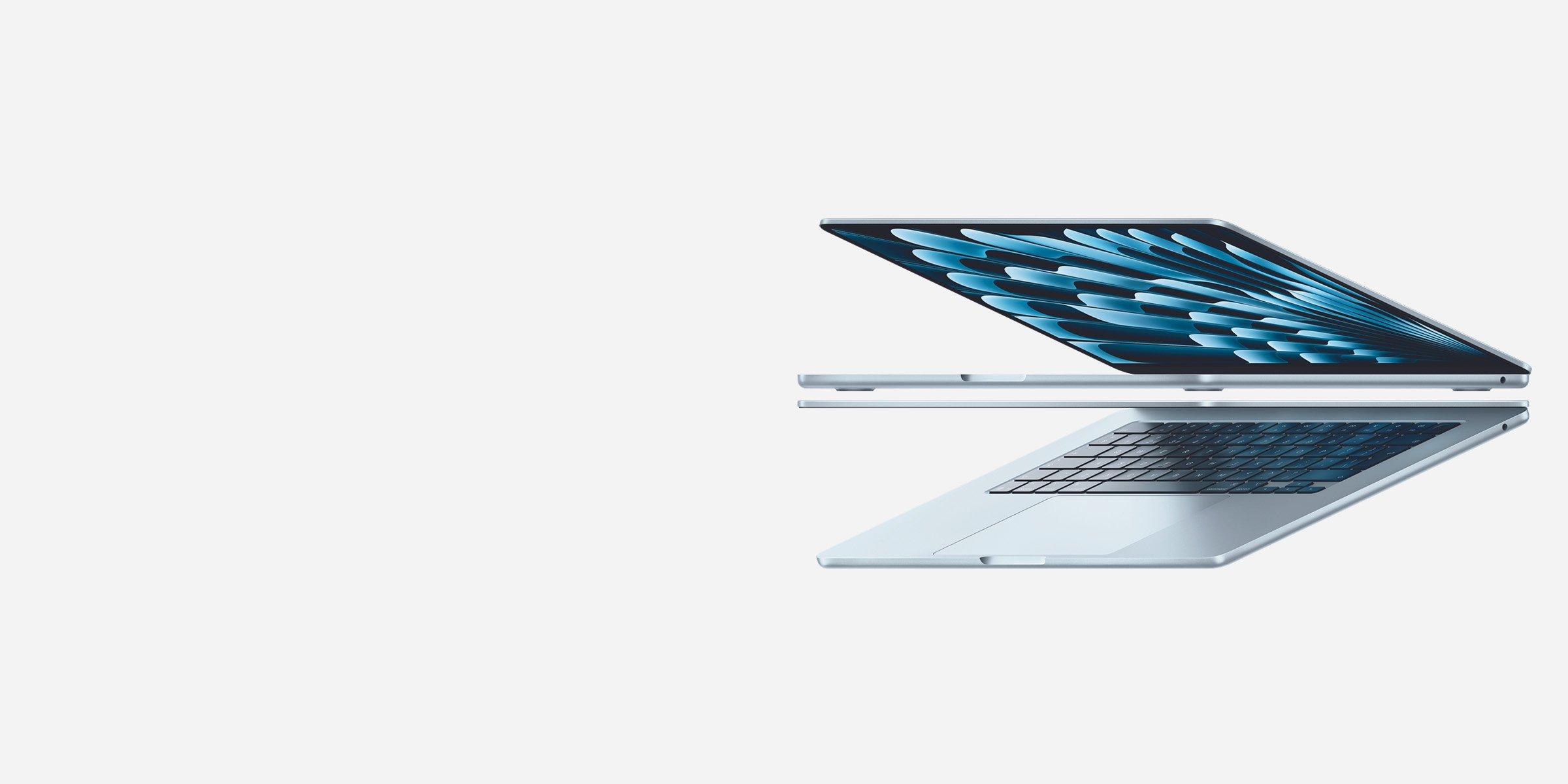 Side view of a sleek, partially open silver air MacBook with a vibrant blue display