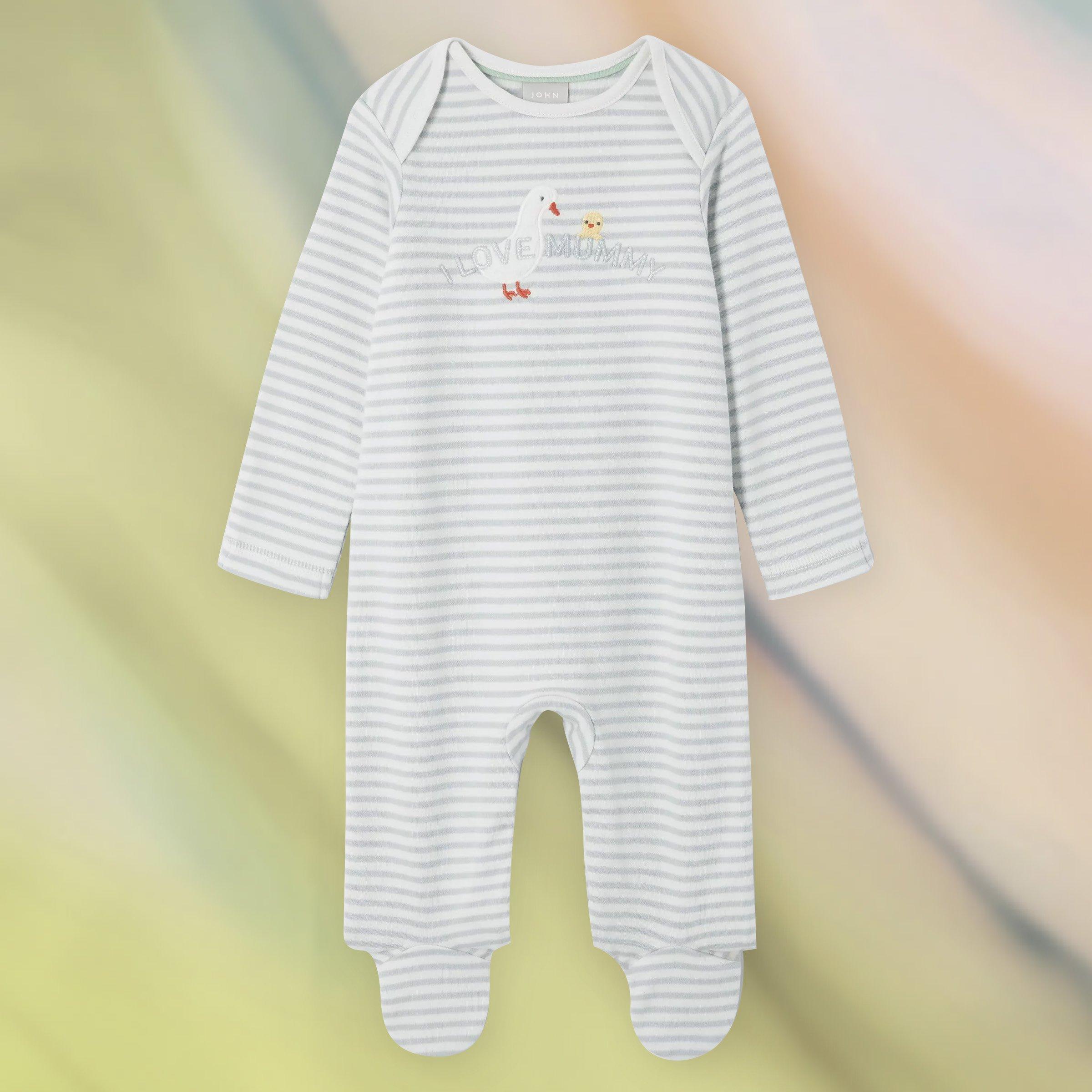 Baby onesie on a Mother's Day background