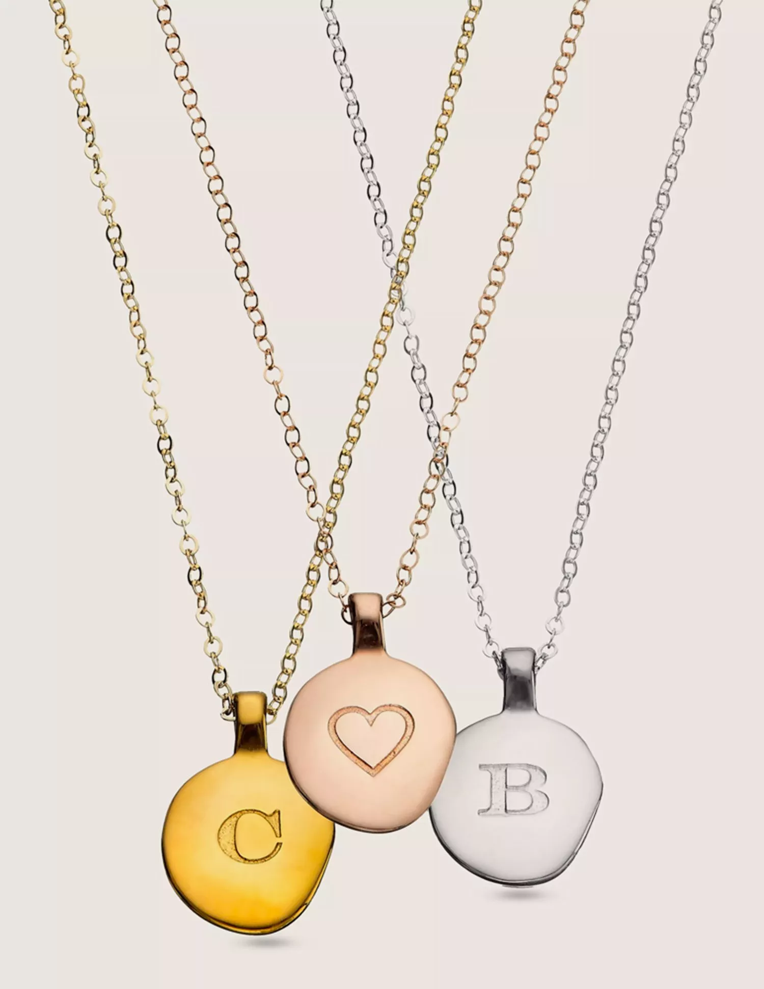 gold, pink and silver necklaces 