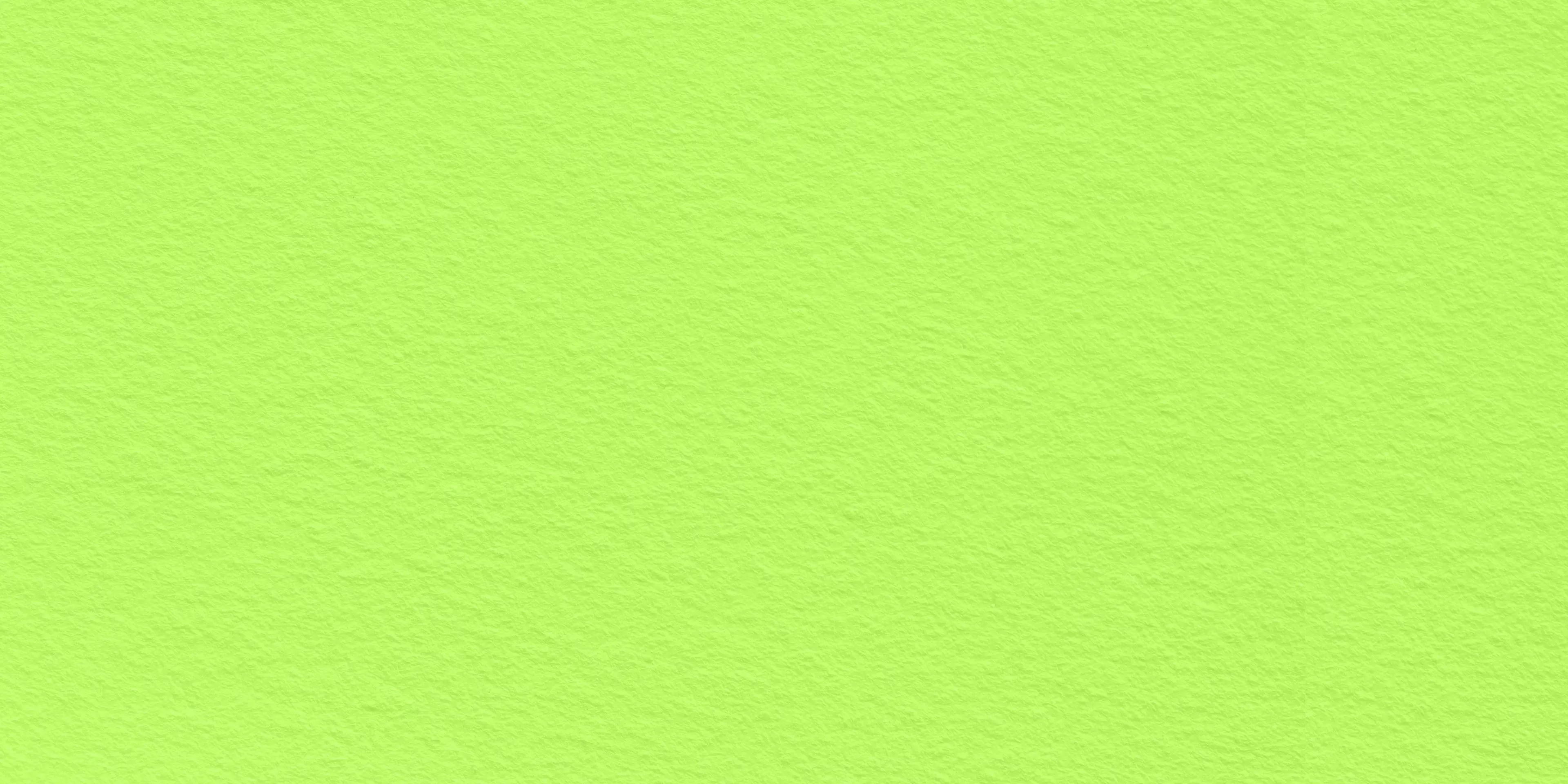 Bright lime green paper texture background, seamless abstract surface for design, wallpaper, and web banners