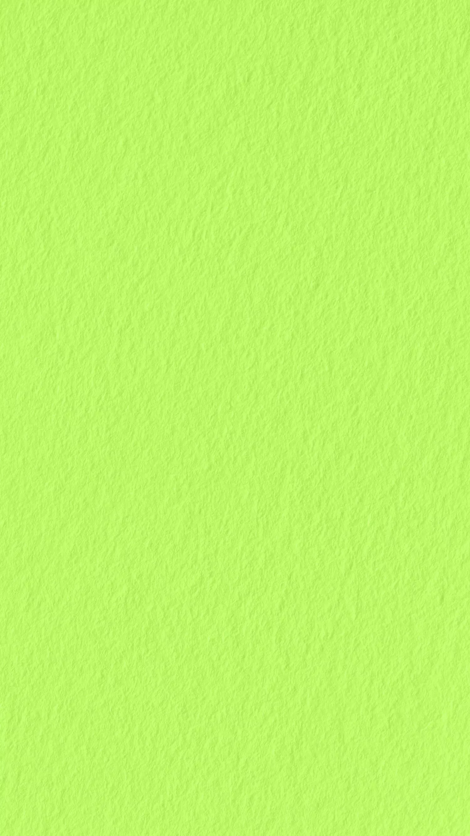 Bright lime green textured paper background, seamless abstract backdrop for design, branding and web banners
