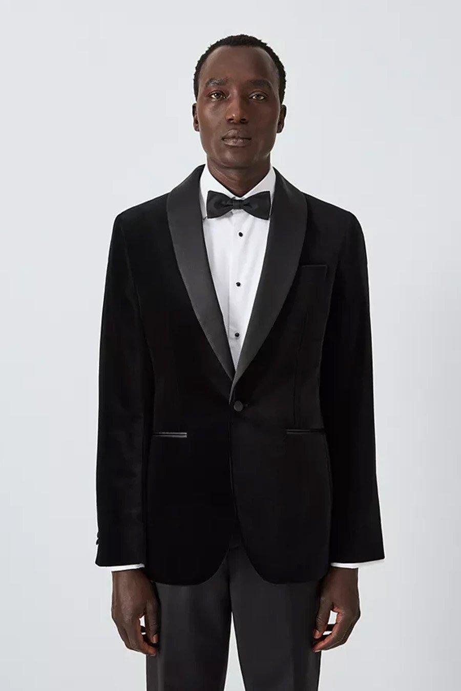 Man in a black Charles Tyrwitt suit