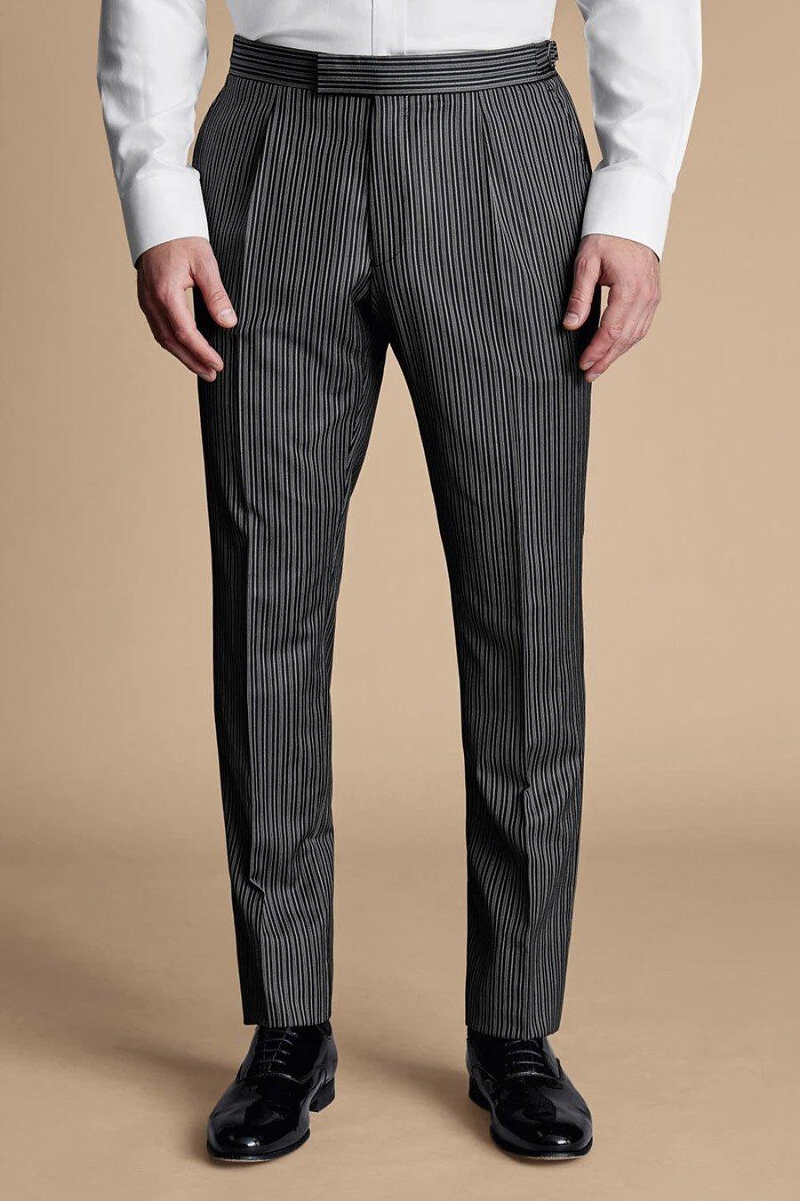 Man in a black Charles Tyrwitt suit