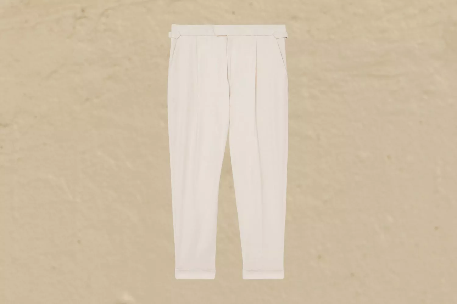 Stone tailored tapered trousers with pleats and cuffed hems