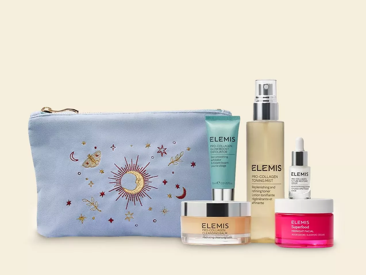 Elemis skincare set with cleansing balm, toning mist, exfoliator, serum, and cream, plus a celestial-themed pouch.