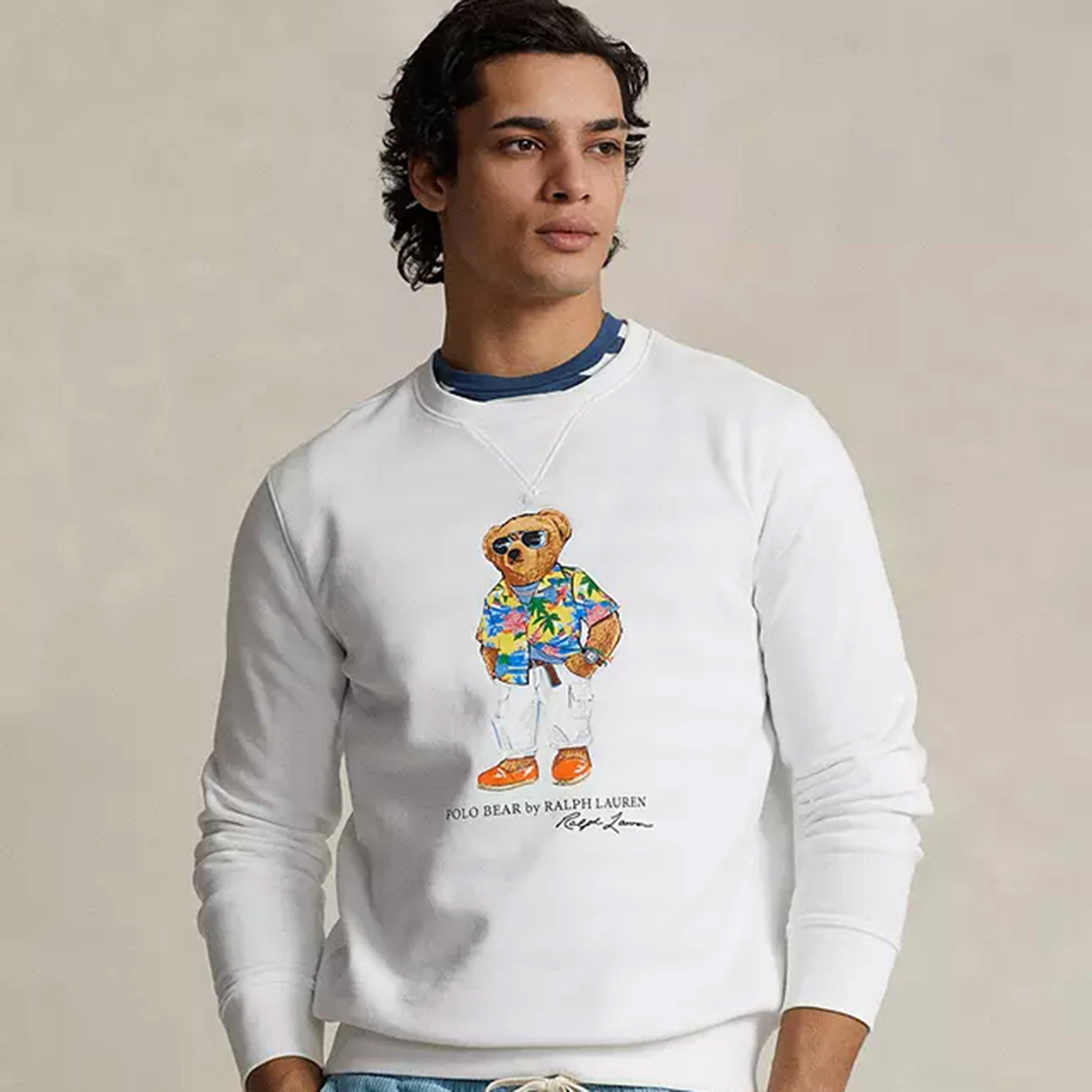 Man wearing sweatshirt with cartoon characters on it