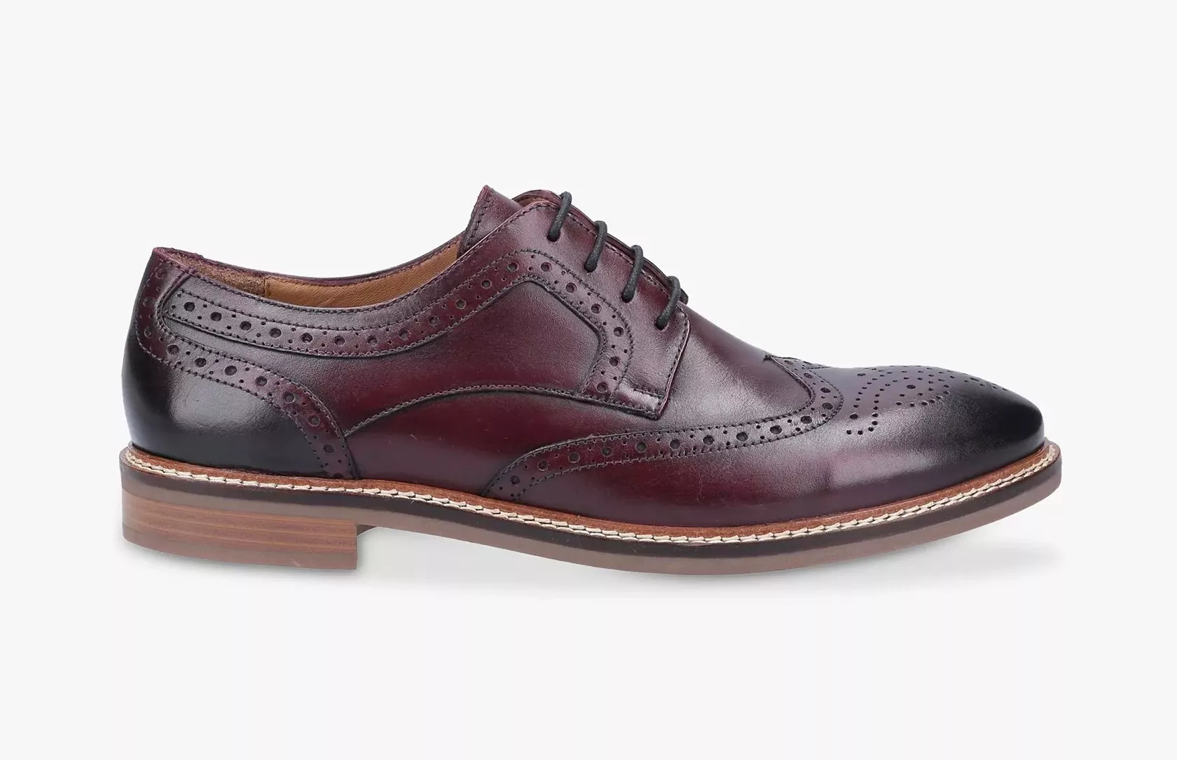 Burgundy leather brogue derby shoe with wingtip perforations and contrast heel, smart men’s formal footwear