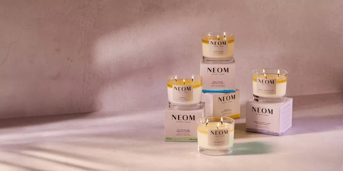 A banner showing Neom candles