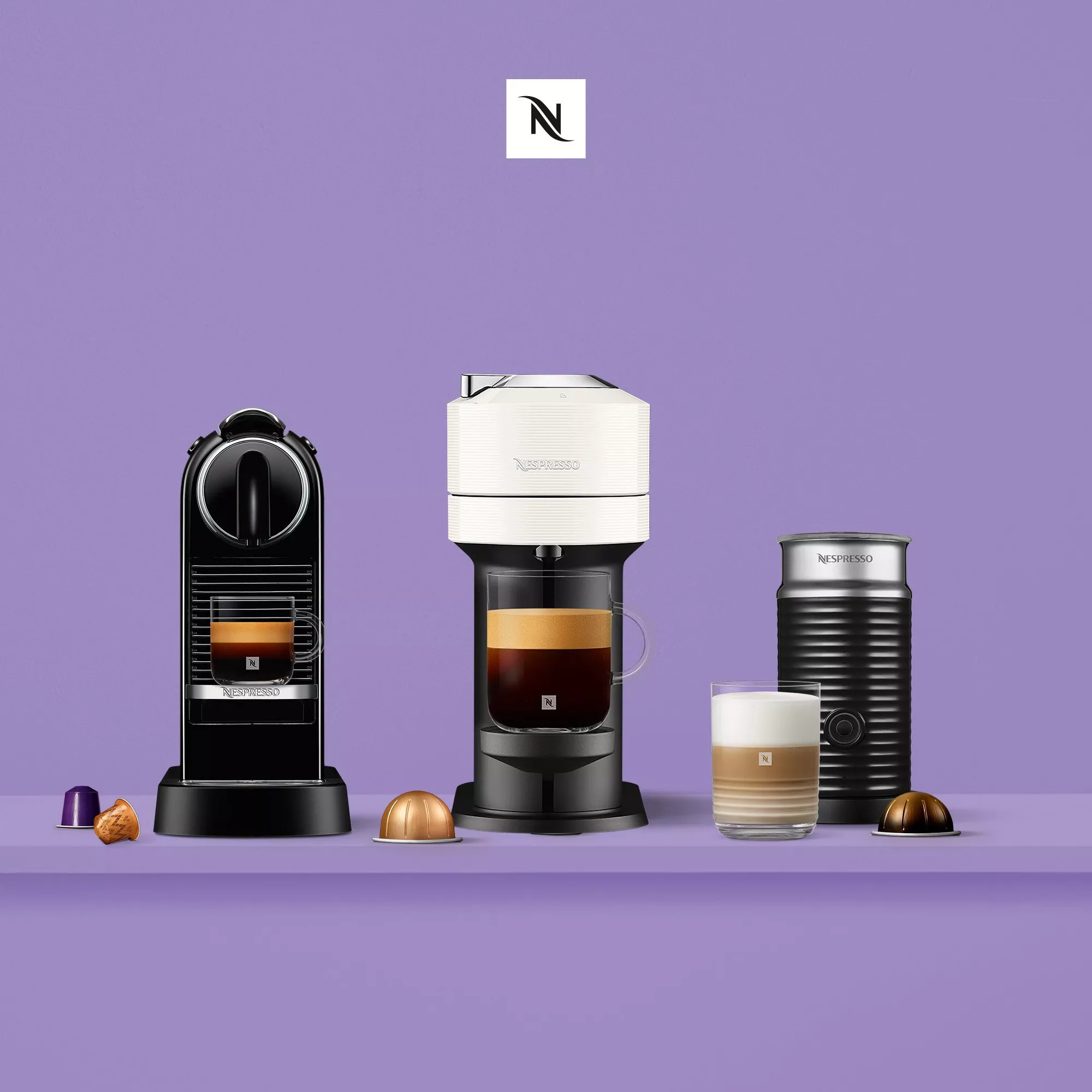 Nespresso pod machine with a jar of coffee pods and a tub of Vital Proteins powder next to it