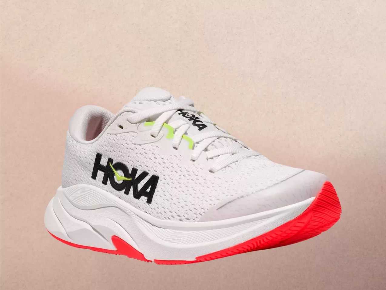 Kid's White Hoka trainer with bold Hoka logo on the side, neon accents, and luminous red sole.