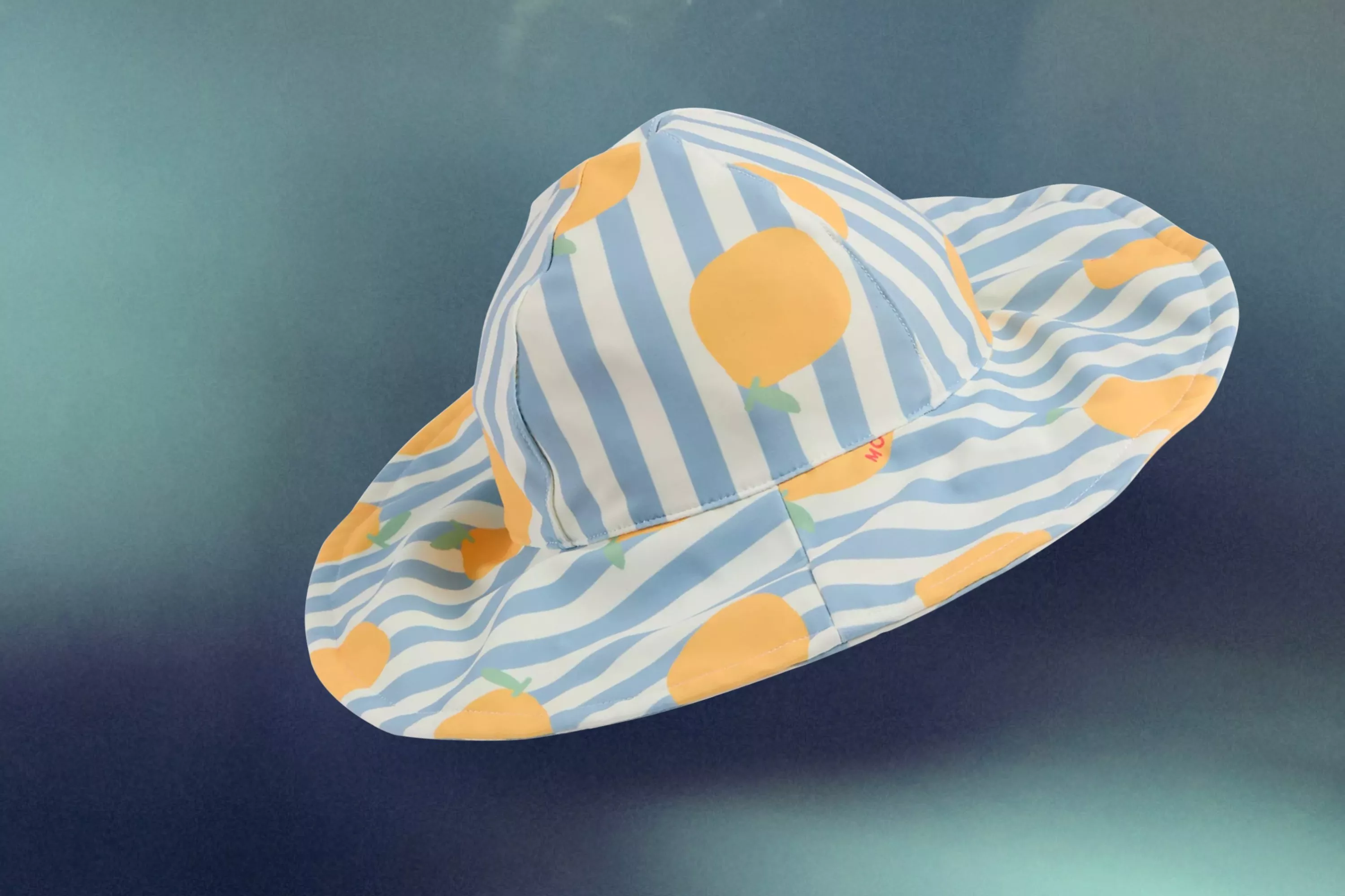 cut out of a MORI Floppy Sun Hat on a hazy blue background