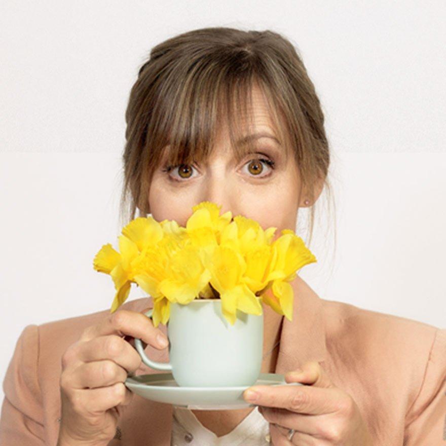 Mel with daffodils and a Teapot