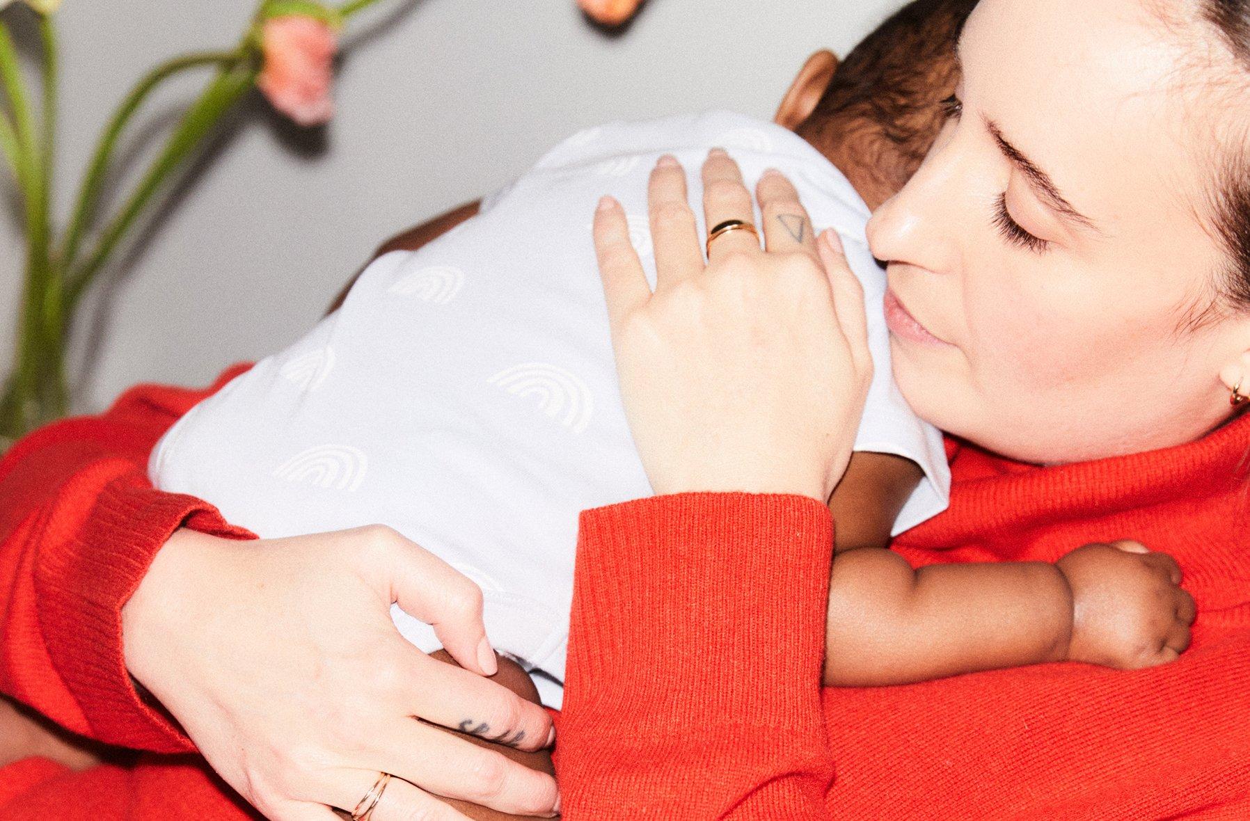 Image of a mother holding her baby